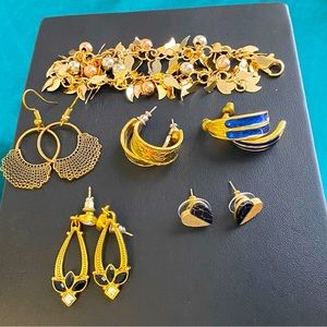 5 gold tone earring and one free gold tone bracelet lot.